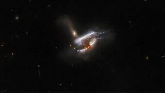 Hubble Uzay Teleskobu, üç galaksinin iç içe geçtiği anı yakaladı