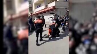 Gözaltı işlemine tepki gösterenler ile polis arasında arbede: 4 yaralı