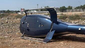 SON DAKİKA: İzmir'de sivil helikopter kalkış yaptığı sırada yan yattı!