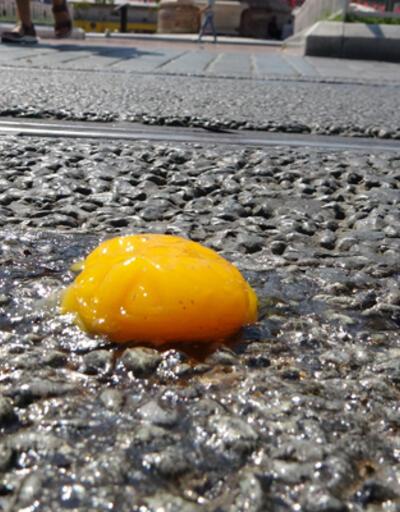 İstanbulda hava sıcaklığı 38 dereceyi gördü Asfaltta yumurta pişirip yedi